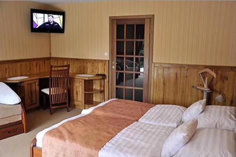 Trojka Hotel Es Panzio Сольнок Номер фото